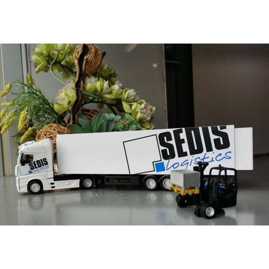 Camion Mercedes Bburago avec chariot élévateur et accessoires