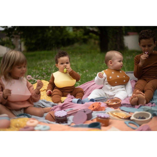 Bavoir en silicone SOINA, jaune pastel