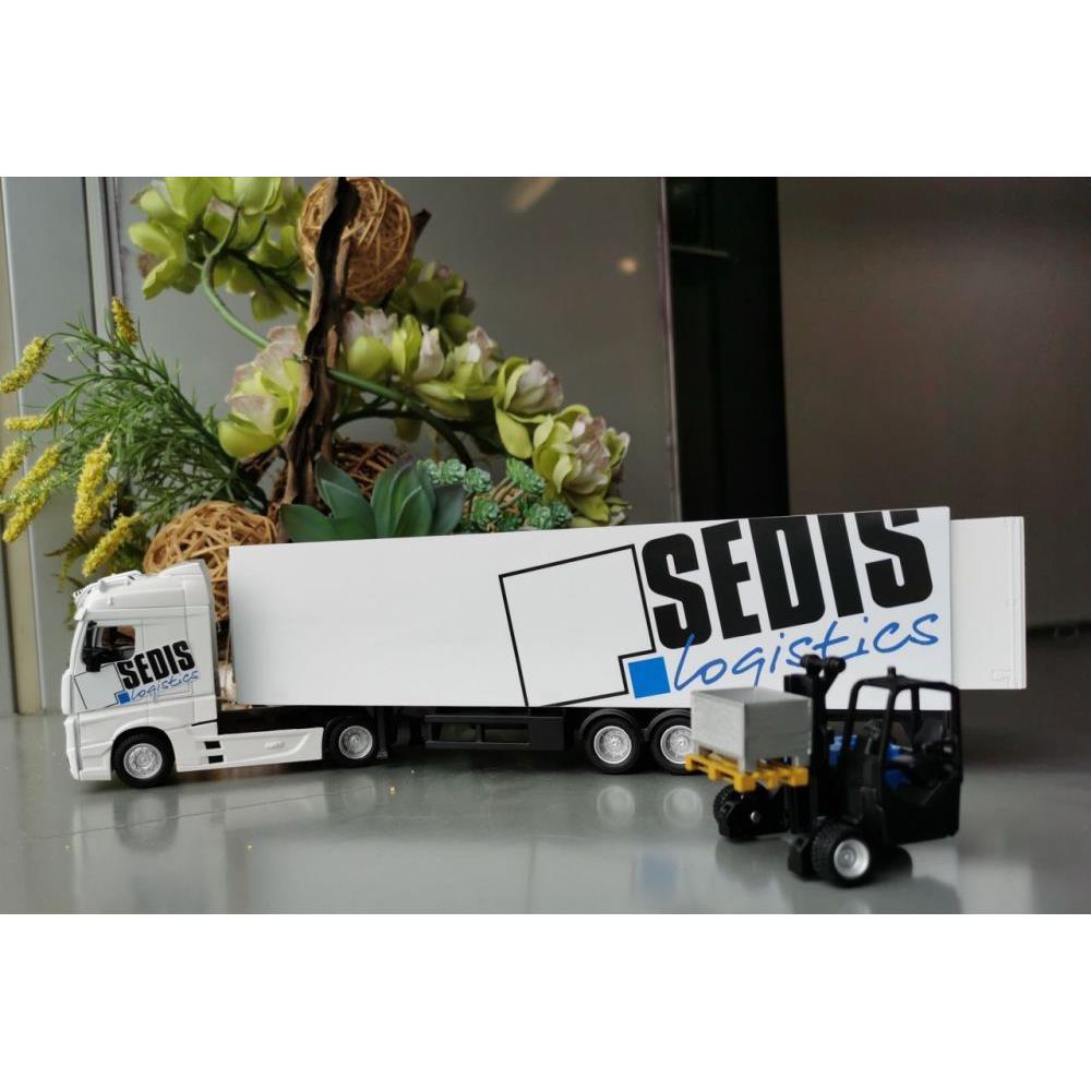 Camion Mercedes Bburago avec chariot élévateur et accessoires