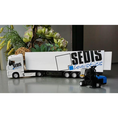 Camion Mercedes Bburago avec chariot élévateur et accessoires