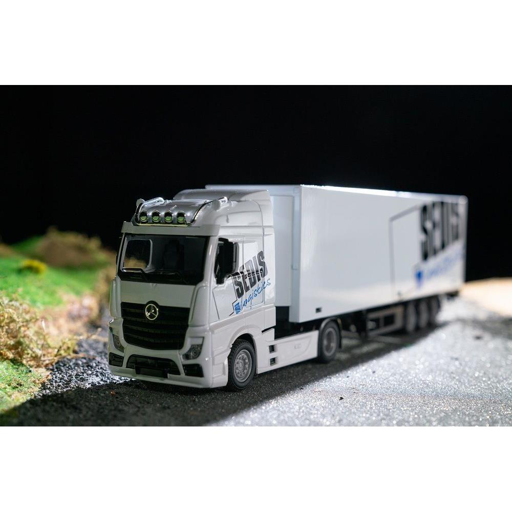 Camion Mercedes Bburago avec chariot élévateur et accessoires