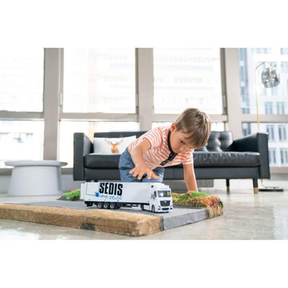 Camion Mercedes Bburago avec chariot élévateur et accessoires