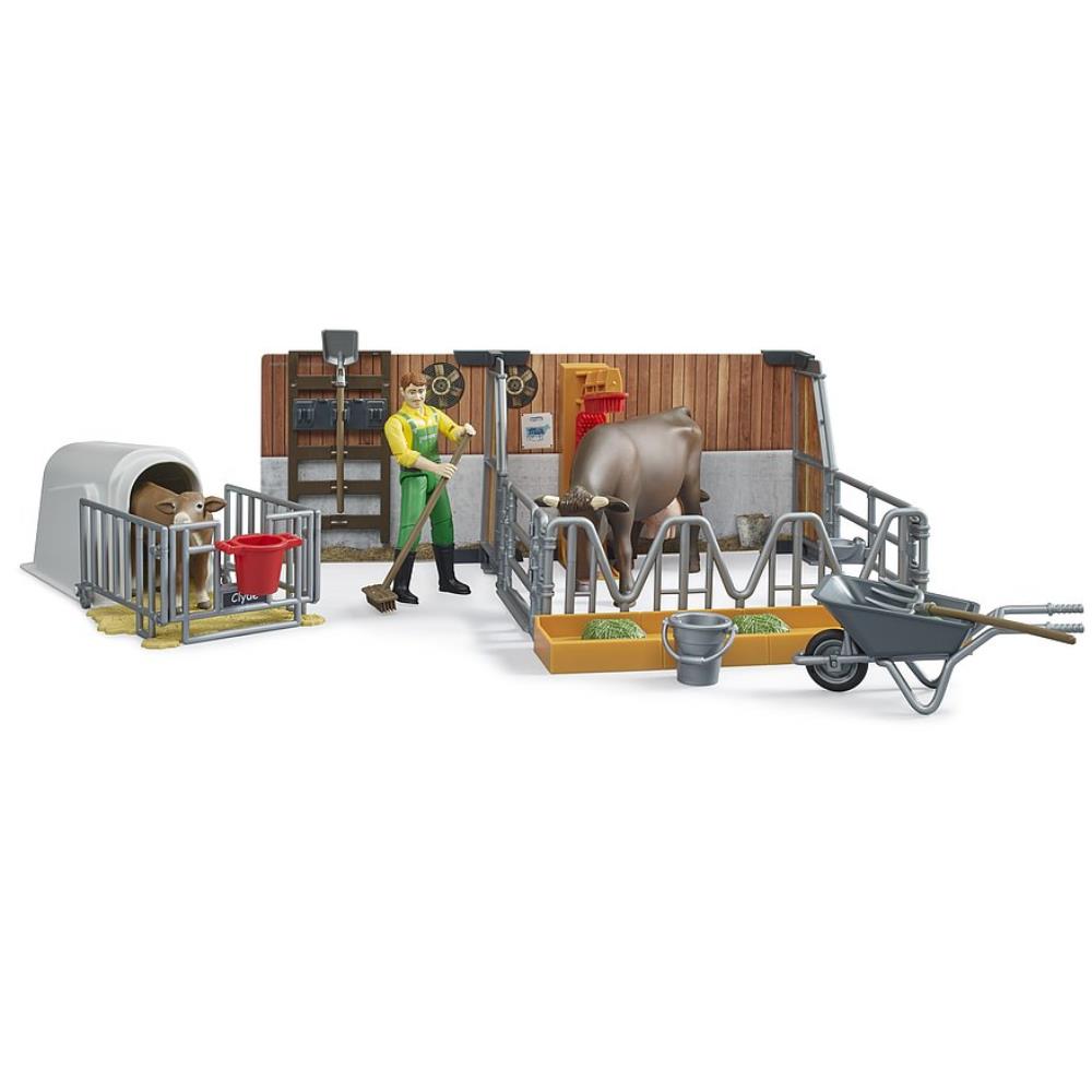 Frère vache et veau stable avec agriculteur