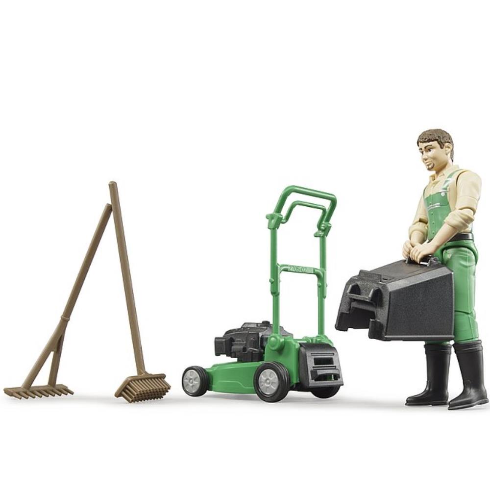 Frère jardinier avec tondeuse à gazon et outils de jardin